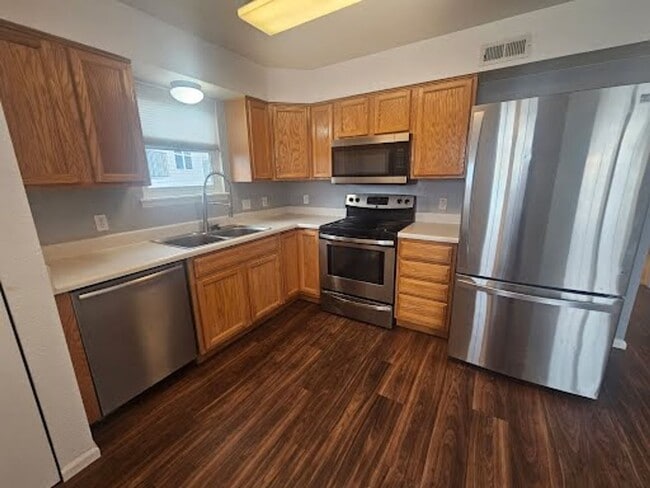Building Photo - **Coming Soon** 2 Bed/2 Bath Top Floor Condo with Covered Garage Space and Additional Storage
