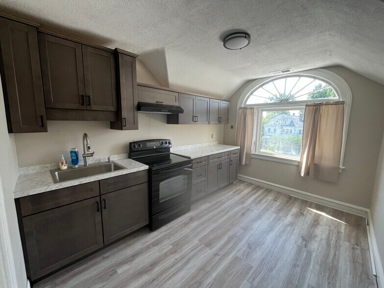 New cabinets and flooring - 784 Farmington Ave