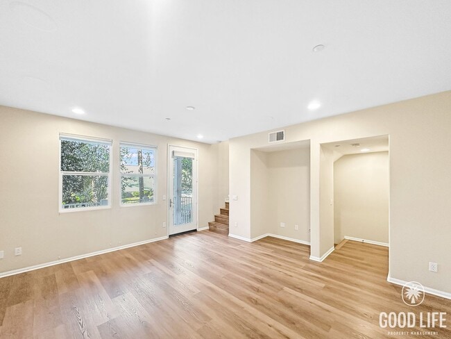 Building Photo - Modern 3-Story Townhome in Bay Park – 3BR/3.5BA with Pool, Balcony & In-Unit Laundry