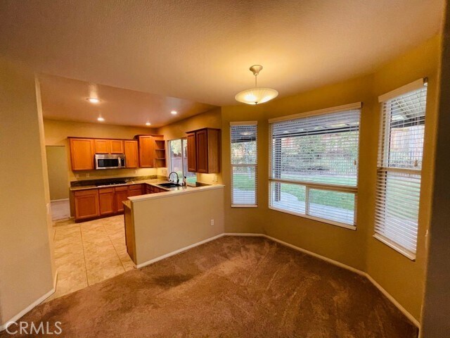 Building Photo - 42020 Dahlia Way