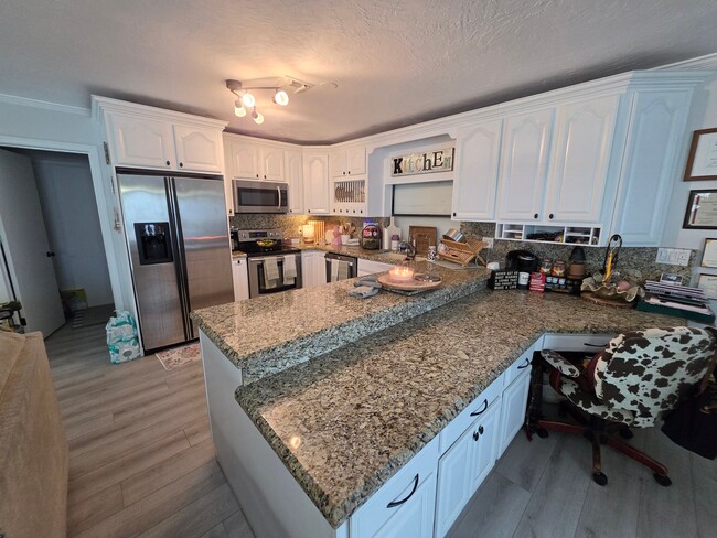 Building Photo - 5980 Woodwind Ct