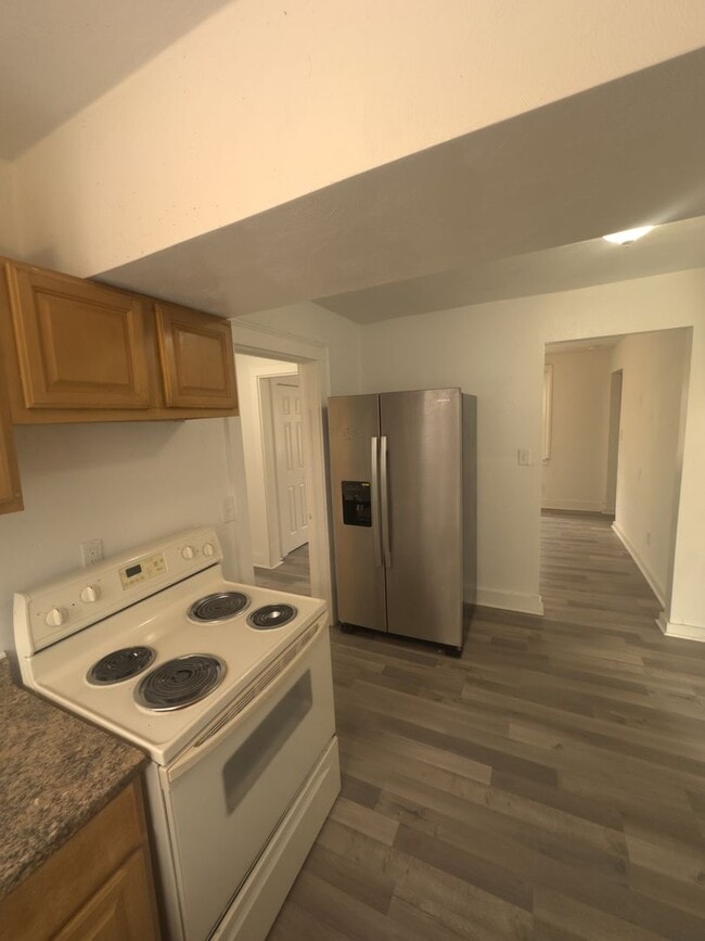 Building Photo - Three Bedroom Available Soon!