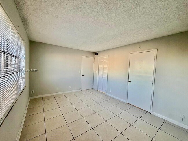 Building Photo - 8750 N Sherman Cir