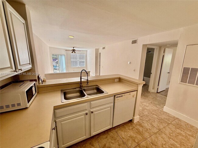 Building Photo - 1845 Palm Cove Blvd