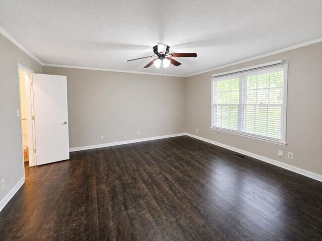 Building Photo - Welcome home to the perfect blend of peaceful country charm and modern city living!