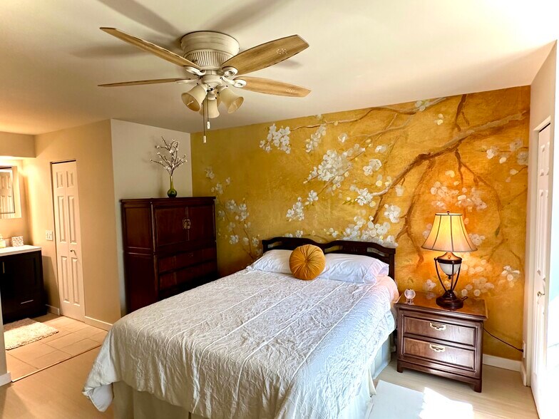 Master bedroom. Wallpaper from Sweden of cherry blossoms. - 174 Hemingway Ct