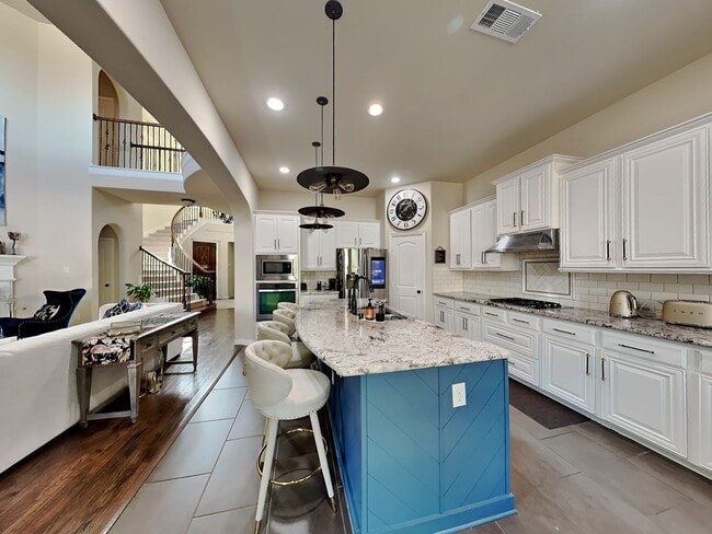 Building Photo - A Stone Hollow Showstopper: Grand Design, Gourmet Kitchen & Outdoor Living