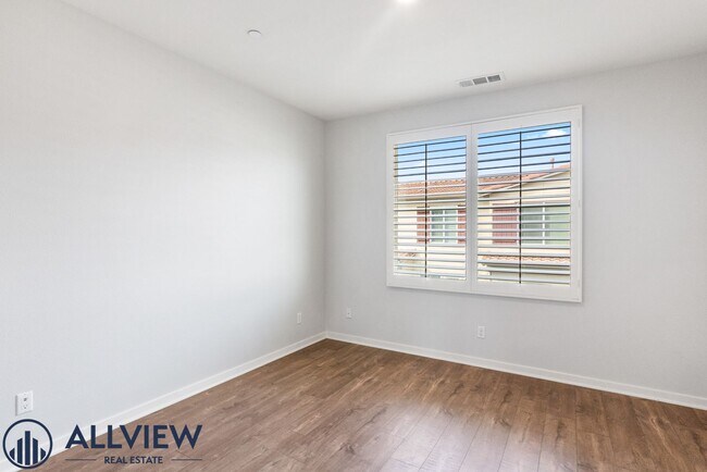 Building Photo - Modern Tri-Level Townhome with Office, 2-Car Garage & Prime Anaheim Location!
