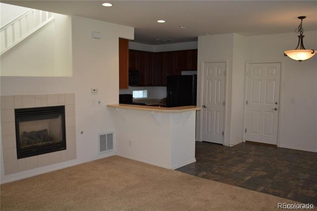 Building Photo - 8388 E 23rd Ave