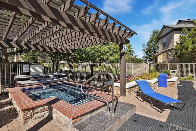 Building Photo - Charming 1 bed/1 bath Condo with Garage- Gated Community with Pool and Fitness Center