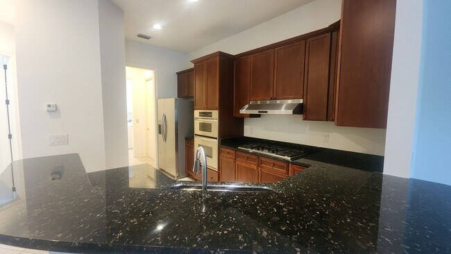 Building Photo - Huge 3 Bed 2.5 bath Home in Palencia- Main Bedroom downstairs plus Upstairs Efficiency