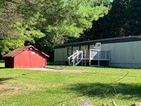 Building Photo - 2 bedroom 2 bath mobile home for rent on half acre!