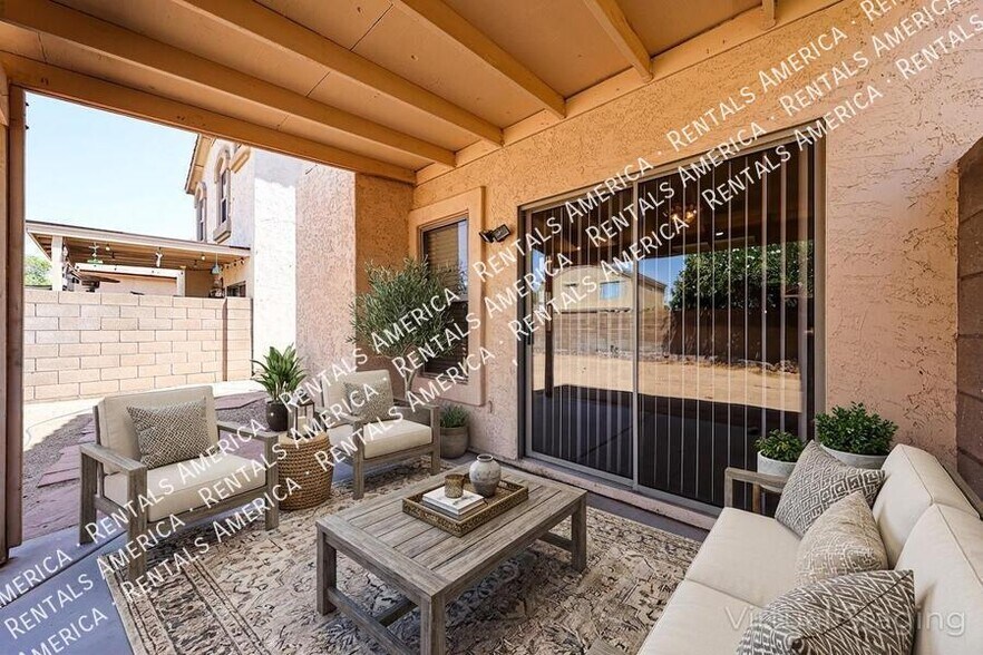 Building Photo - 10060 E Capri Ave