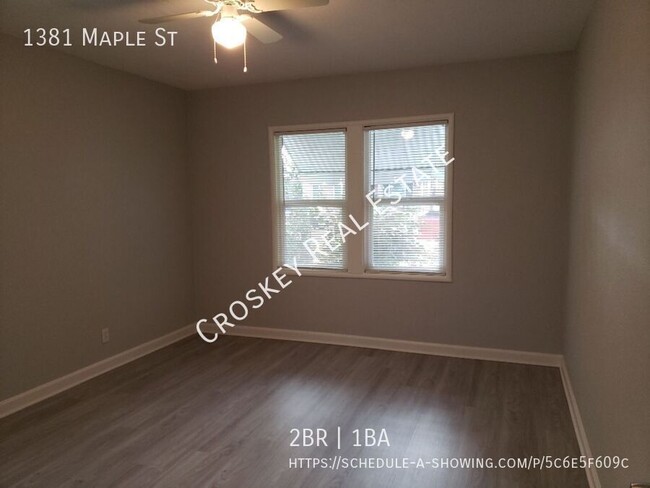 Building Photo - Remodeled unit, close to schools, easy acc...