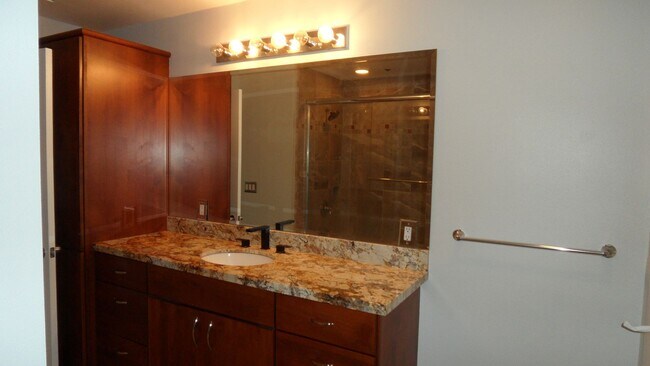 Building Photo - Office Space Living 2 BR 2.5 BA Attached 2 Car Garage