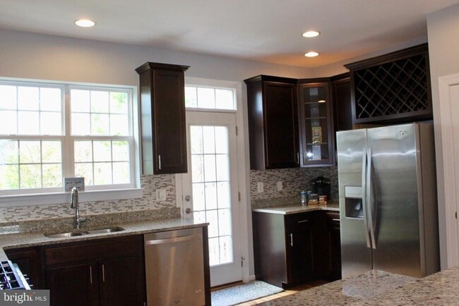Building Photo - 7452 Riding Meadow Way