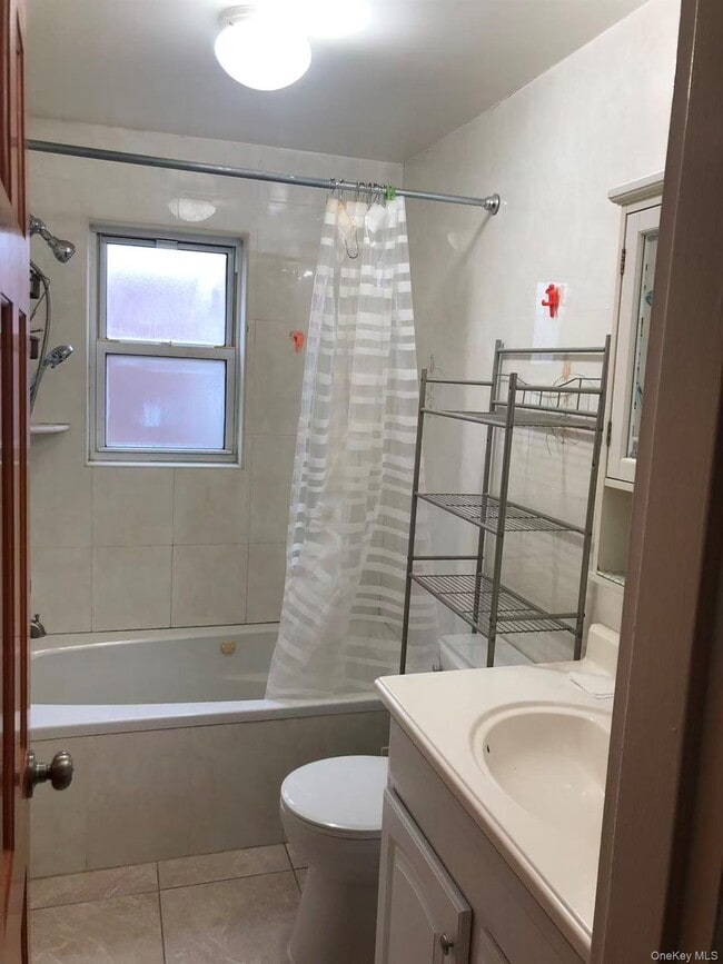 Building Photo - 229-02 Horace Harding Expy