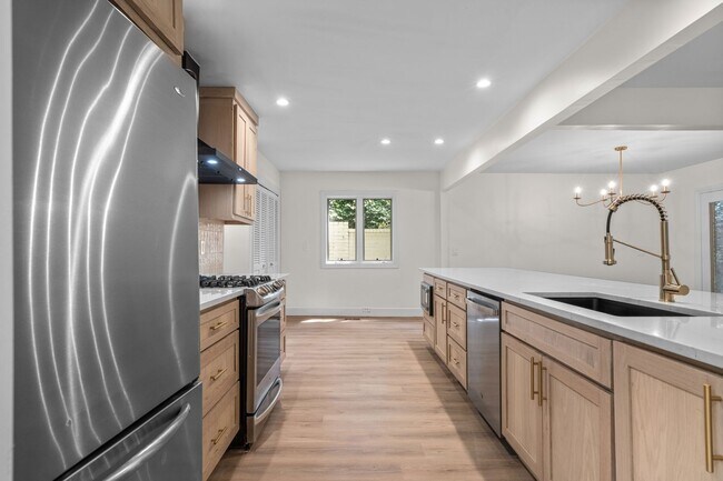 Building Photo - Totally renovated open concept with vaulted ceilings