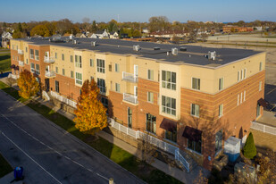 Contemporary Building - Uptown Brass Apartments