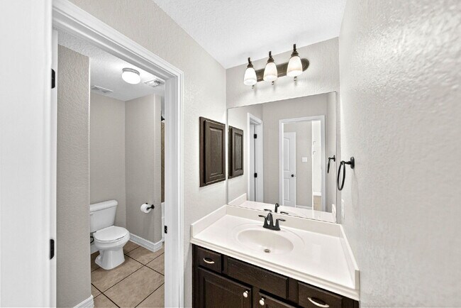 Building Photo - Corner Homesite. Gated Community. 4 Bedroom 1 Story with Formal Dining and Formal Office