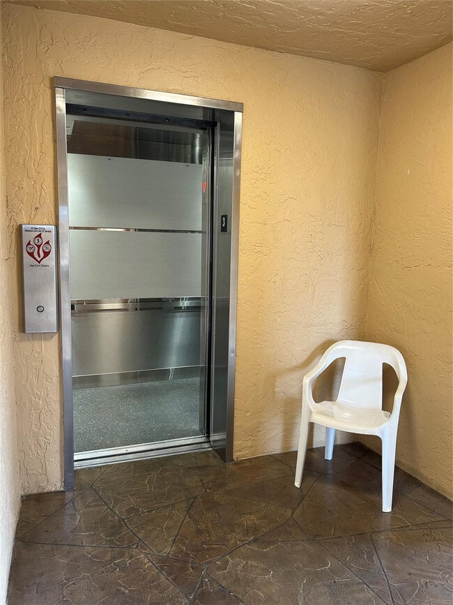 Building Photo - 6770 Royal Palm Blvd