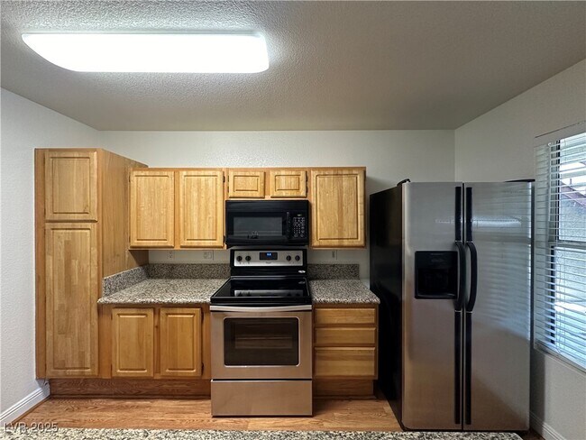 Building Photo - 5055 W Hacienda Ave