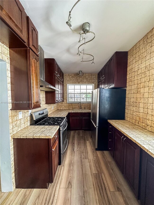 Building Photo - 8926 Dickens Ave