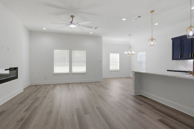 Building Photo - "New Construction 3-2-2 Home with Designer Touches Throughout!"
