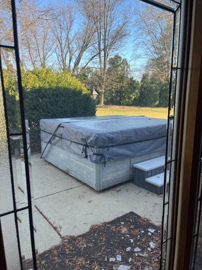 Building Photo - Spacious, Fully Updated Home with Walkout Basement on a Mature Lot