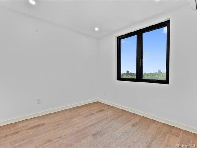 Building Photo - 124-28 Queens Blvd