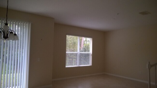 Building Photo - Spacious 3 Bed, 2.5 Bath Townhome with 2-Car Garage | Gated Tucker Oaks Community in Winter Garden