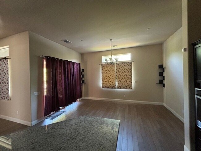 Building Photo - Elegant 4-Bedroom Home with Paid Solar in Gated Village Green Community