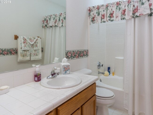 Building Photo - Charming 4-Bed, 2-Bath Home with Vaulted Ceilings, Dual Fireplaces & Serene Outdoor Spaces