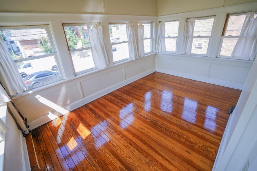 Building Photo - 72-72 1/2 E 14th Ave-SFH