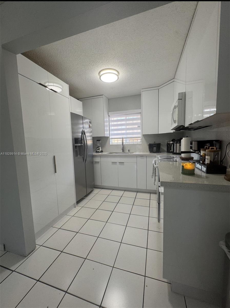 Building Photo - 7965 W 30th Ct