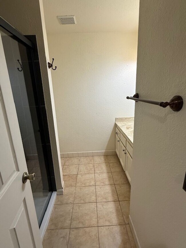 Building Photo - Private Redwood Setting | 4BR Home with Family Room, Bar & Garage Workspace - Available Now