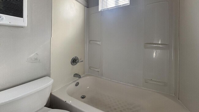 Building Photo - Move-In Ready 3-Bedroom Home with Stylish Hardwood-Style Flooring