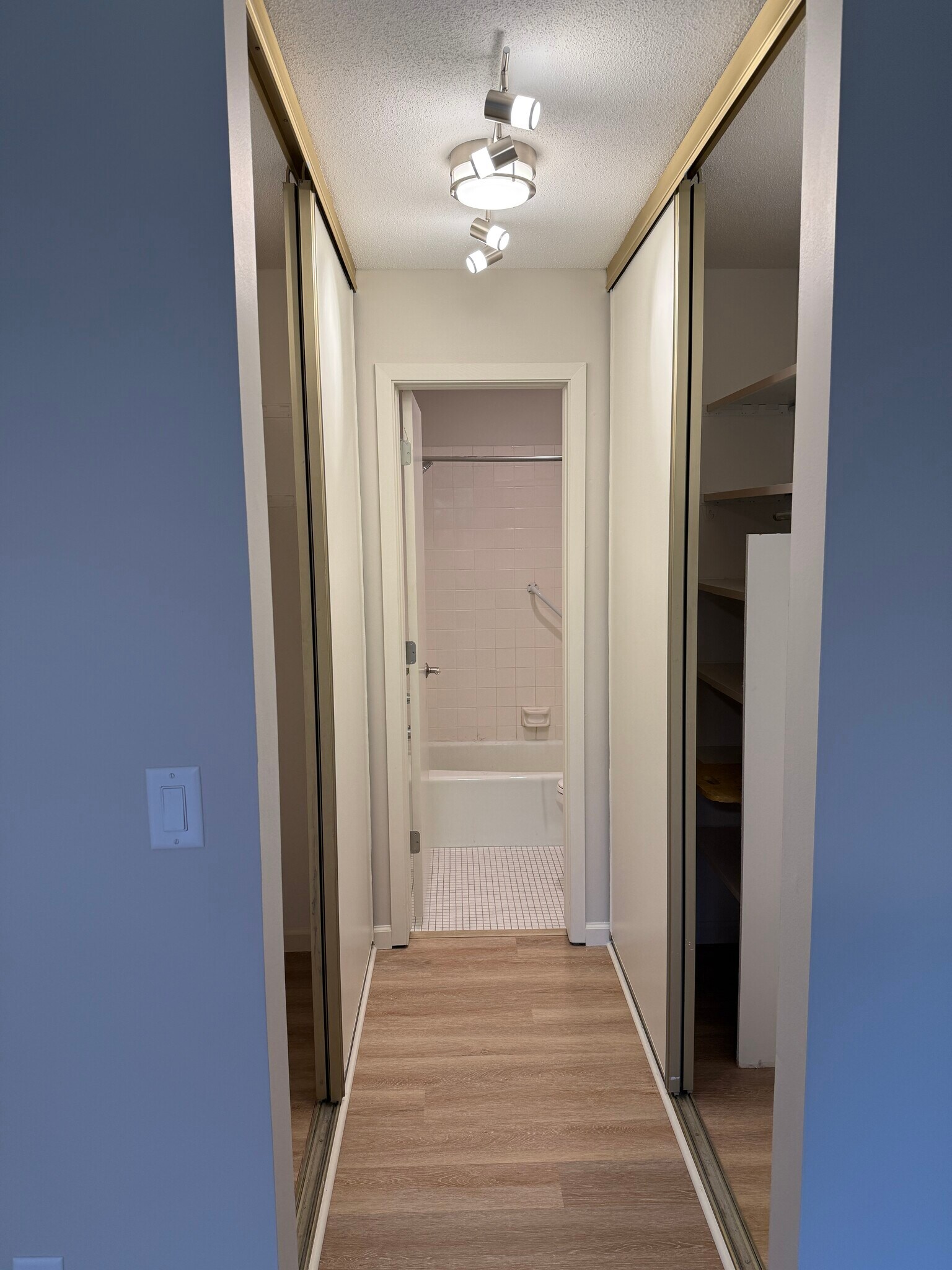 From Master Bedroom Walk Im Closet Looking Into Shower & Toilet Room - 9400 Old Cedar Ave S