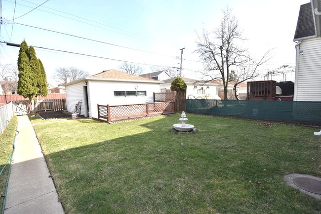 Building Photo - 3855 N Nora Ave