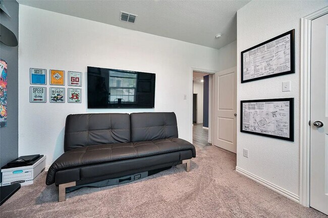 Building Photo - Stylish 4-bedroom home with quartz kitchen, luxury flooring, covered patio, and resort-style amen...