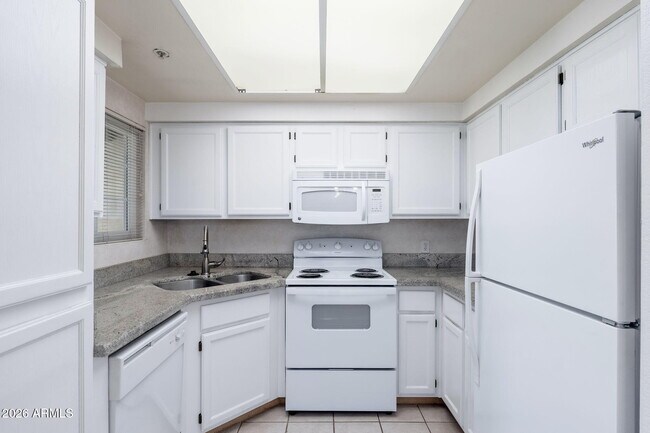 Building Photo - 9450 E Becker Ln