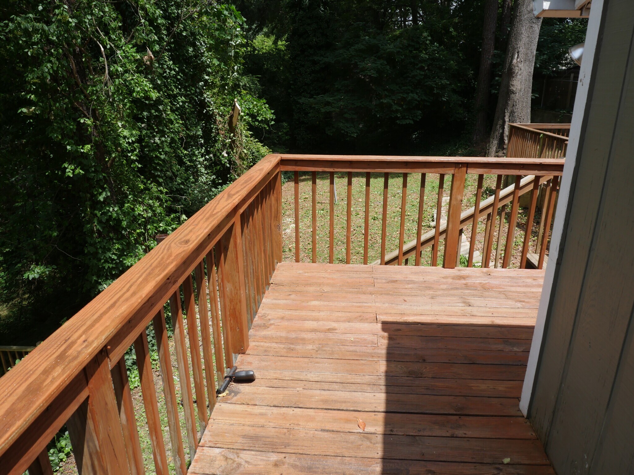 Stained back deck and backyard - 1065 Atlantic Dr NW