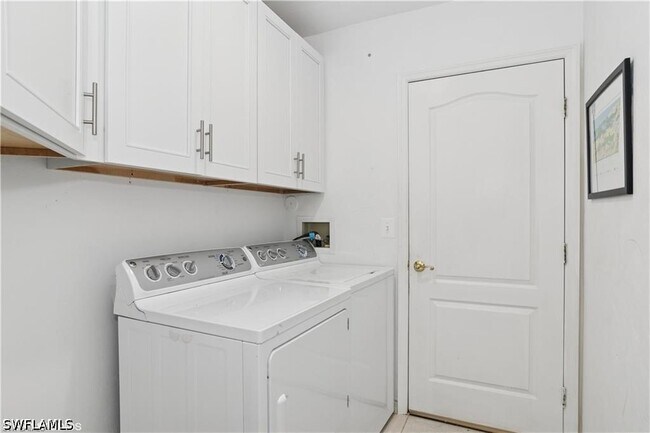 Building Photo - 7048 Pelican Bay Blvd