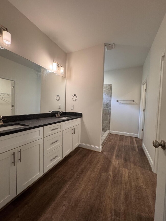 Building Photo - Sign a 12-month lease now and receive the ...
