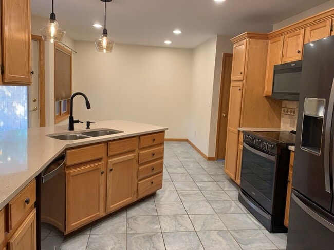 Building Photo - West-Side Gem! Sprawling Single-Family Home w/ Finished Basement
