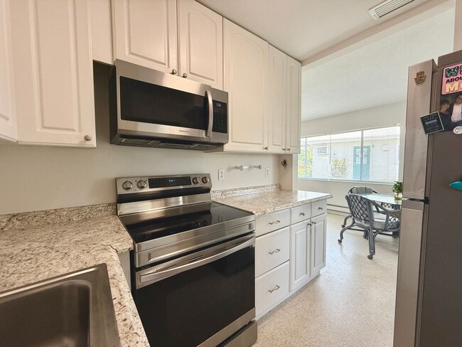 Building Photo - Water & Cable Included • 55+ Community - Convenient & Cozy One Bedroom + Office Home
