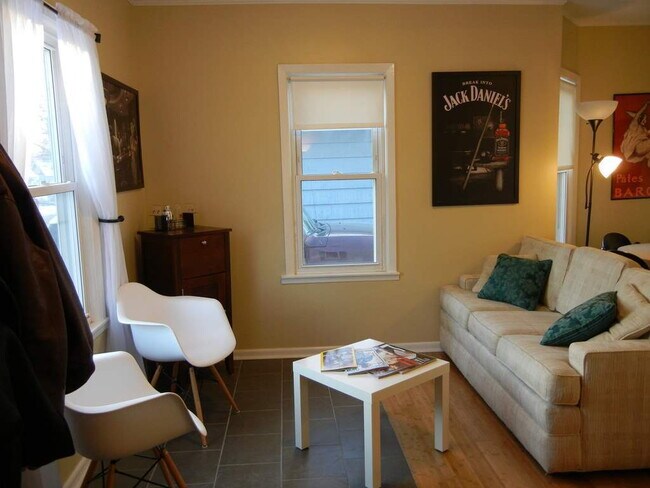 Building Photo - Charming 4-Bedroom Minneapolis Home with Finished Basement & Hardwood Floors