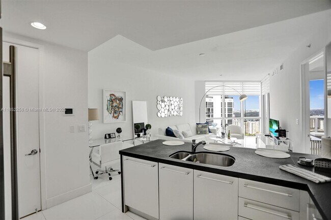 Building Photo - 18201 Collins Ave