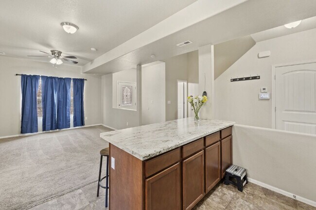Building Photo - "Beautiful Townhome 3-Bedroom  2.5 Baths no carpet home, just 7 minutes from Fort Carson!"