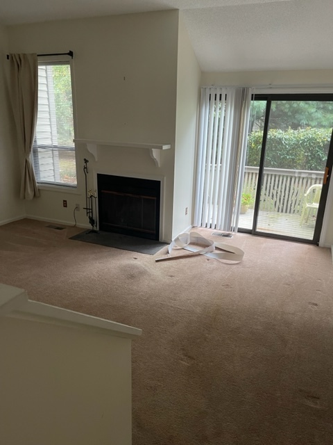 living room - new carpet - 75 Metacomet Dr